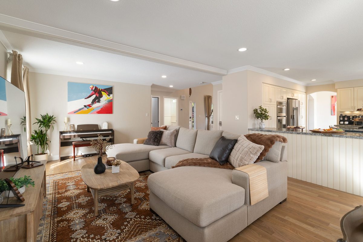 Living room with sectional and gas fireplace