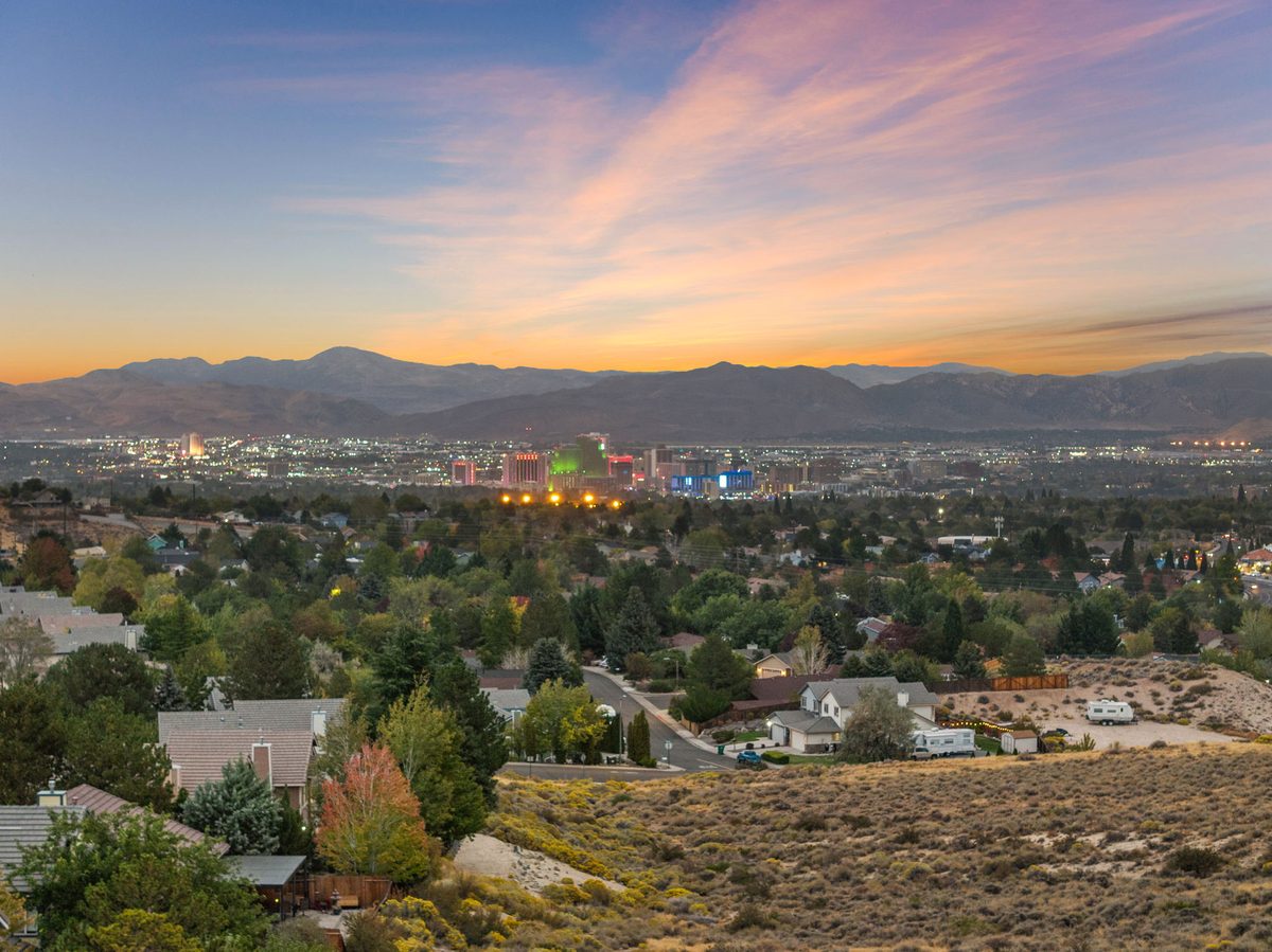 Reno's city lights from the backyard at dusk